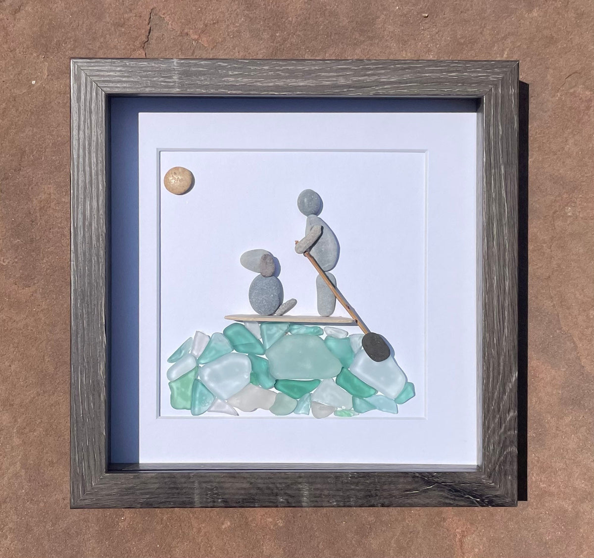 Paddle Boarding With Dog Framed Sea Glass and Pebble Art, ~ 9 x 9 inches