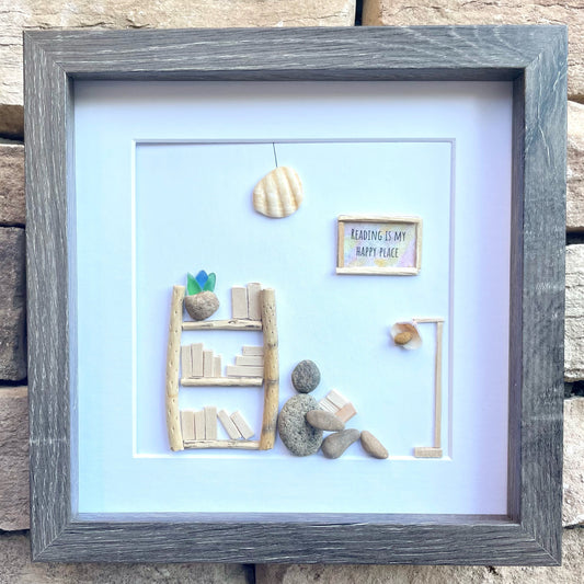 Unique Gift for Book Lovers, 8x8 Pebble Art Picture of Reader Surrounded by Books, Wall Sign Says "Reading is My Happy Place"