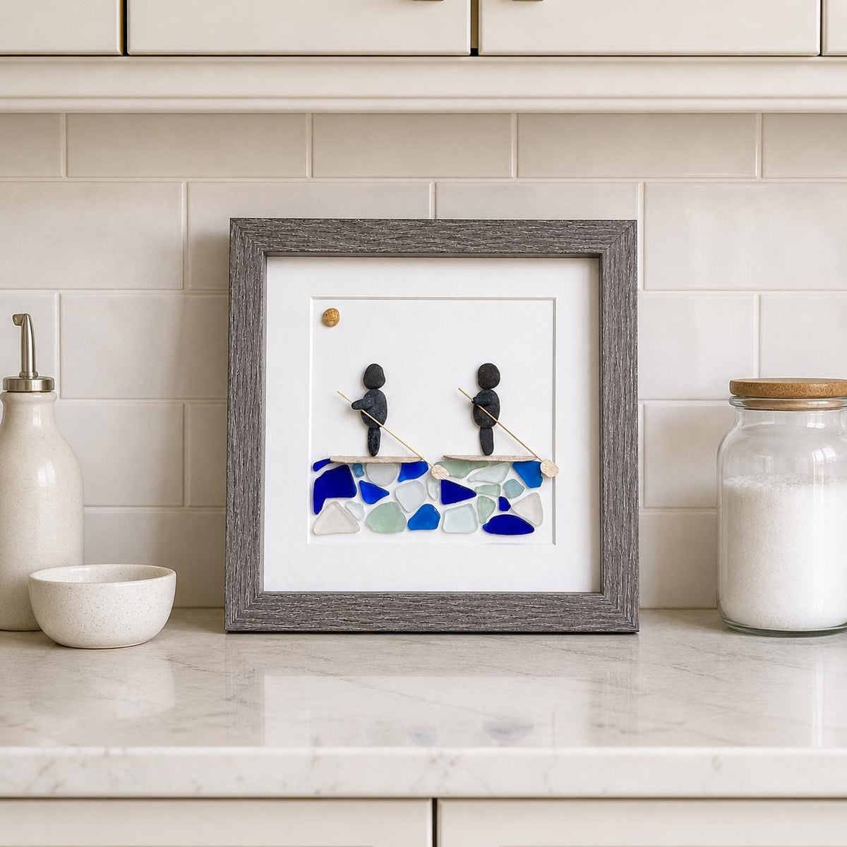 Paddle Boarders with Blue Water. Framed 9x9 Sea Glass & Pebble Artwork, Handmade Gift for Couple or Friends
